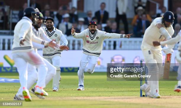 Rishabh Pant and Virat Kohli of India celebrate the final wicket and winning the Second LV= Insurance Test Match between England and India at Lord's...