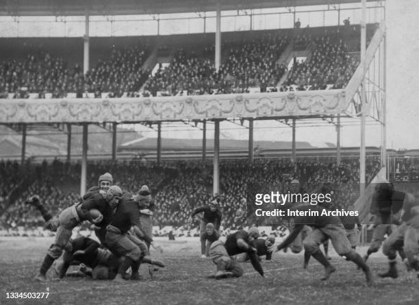 View of on field action during the annual Army Navy football game at the Polo Grounds, New York City, New York, November 25, 1916. Army won the game...