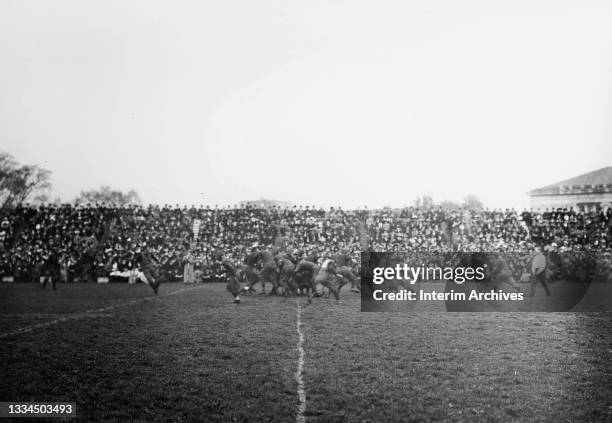 View of on field action during an American football game between Army and Yale University, at West Point, New York, October 19, 1912. Yale won 6-0.