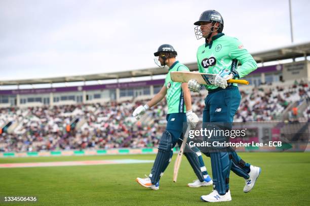 Jason Roy and Will Jacks of Oval Invincibles walk out to bat during The Hundred match between Southern Brave Men and Oval Invincibles Men at The...