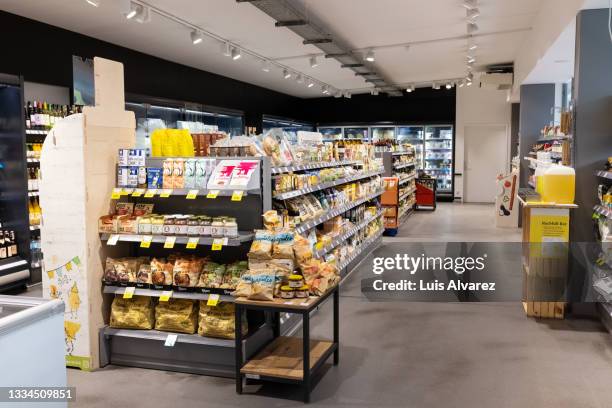 interior of a large grocery store - supermarket shelves stock-fotos und bilder