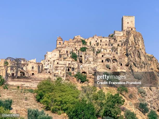 General view of Craco, a ghost town and comune in the province of Matera, in the southern Italian region of Basilicata on August 16, 2021 in Craco,...