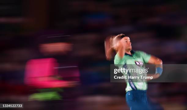 Tom Curran of Oval Invincibles Men in bowling action during The Hundred match between Southern Brave Men and Oval Invincibles Men at The Ageas Bowl...