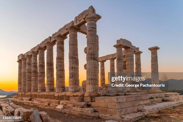 ancient greek temple of poseidon in sounio, greece - ancient greece stock pictures, royalty-free photos & images