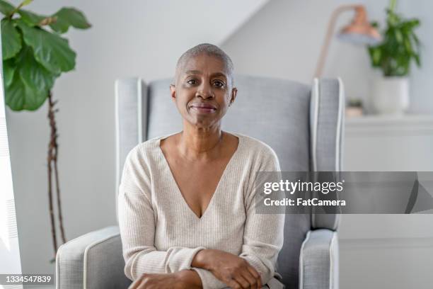 chemo patient at home - afro caribbean portrait stock pictures, royalty-free photos & images