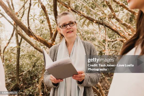 same sex elopement wedding - outdoor wedding ceremony vows stock pictures, royalty-free photos & images