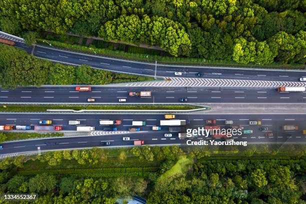 traffic jam on multiple lane highway - traffic jam stock-fotos und bilder