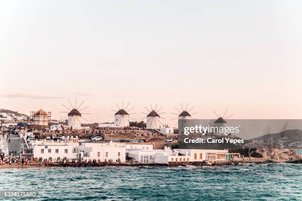 traditional windmills on mykonos island, cyclades, - ios greece stock pictures, royalty-free photos & images