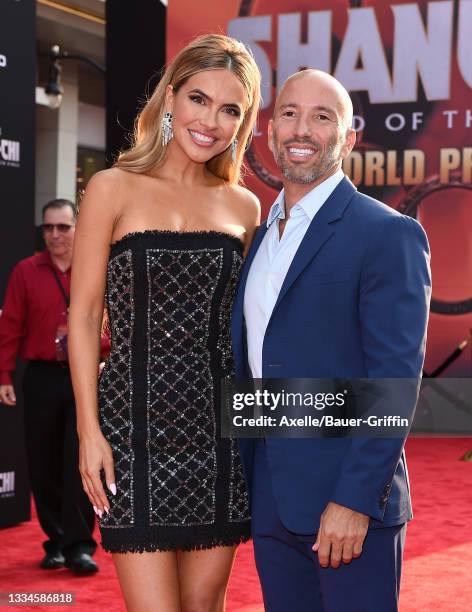 Chrishell Stause and Jason Oppenheim attend Disney's Premiere of "Shang-Chi and the Legend of the Ten Rings" at El Capitan Theatre on August 16, 2021...