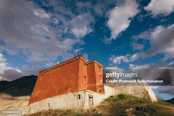 rangdum monastery, tibetan style temple on hill in zanskar valley in summer season, ladakh region in northern india - kashmir flag imagens e fotografias de stock