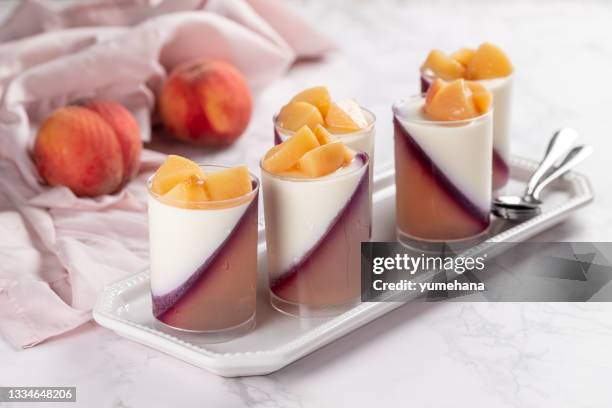 peach panna cotta with peach jelly, italian dessert, homemade cuisine - panna cotta stock pictures, royalty-free photos & images