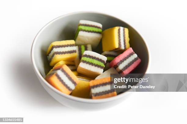 bowl of sweets - allsorts stock pictures, royalty-free photos & images