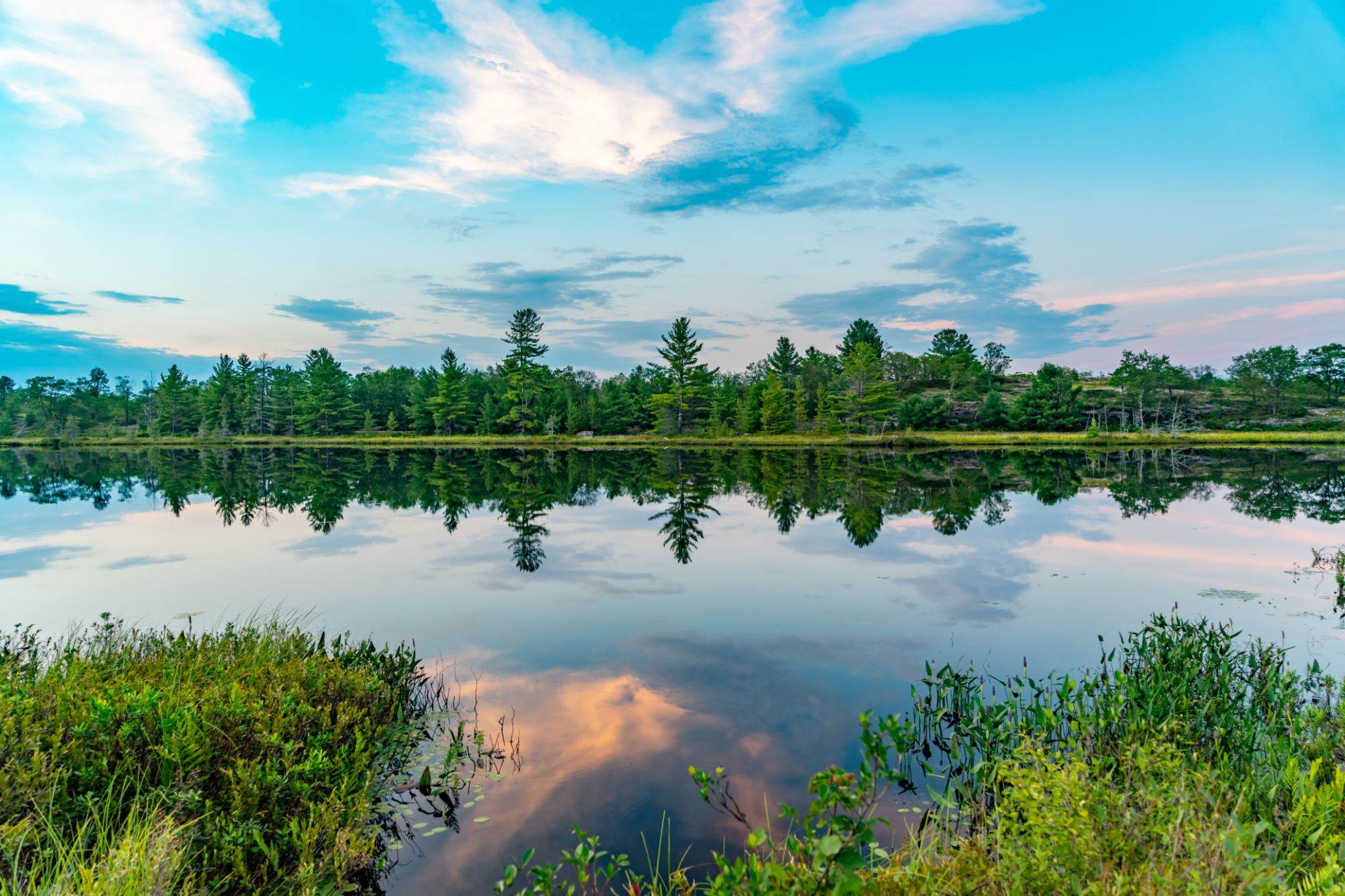 Muskoka Torrance Barrens Dark-Sky Preserve and Highland Pond at dusk, Gravenhurst, Canada Muskoka Torrance Barrens Dark-Sky Preserve and Highland Pond at dusk, Gravenhurst, Canada