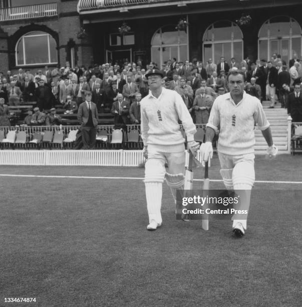 Geoff Boycott and John Edrich opening batsmen for the England cricket team walk out from the pavilion to bat against the touring Australian team...