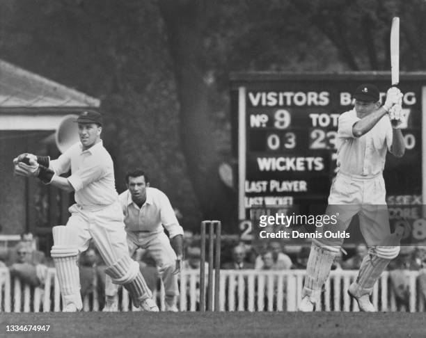 Brian Taylor , wicketkeeper and team captain for Essex looks on as Jonathan Fellows-Smith of South Africa, right-handed batsman and right-arm medium...