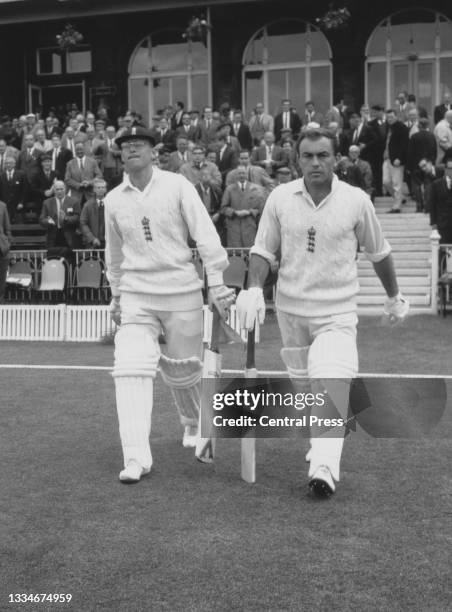 Geoff Boycott and John Edrich opening batsmen for the England cricket team walk out from the pavilion to bat against the touring Australian team...