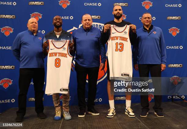 President Leon Rose, Kemba Walker, head coach Tom Thibodeau, Evan Fournier, and general manager Scott Perry of the New York Knicks pose for a photo...