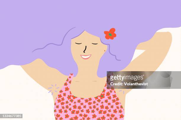 relaxed purple hair woman with armpit hair - behaart stock-fotos und bilder