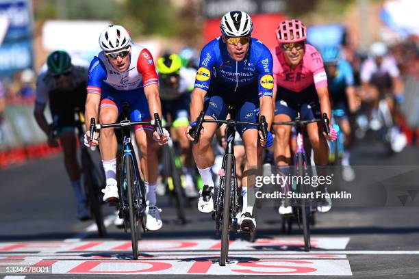 Fabio Jakobsen of Netherlands and Team Deceuninck - Quick-Step celebrates winning stage ahead of Arnaud Demare of France and Team Groupama - FDJ and...