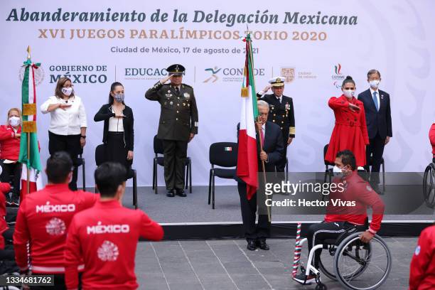 President of Mexico Andres Manuel Lopez Obrador flags the Mexican athlete Edgar Barajas during the paralympic delegation's farewell at Palacio...