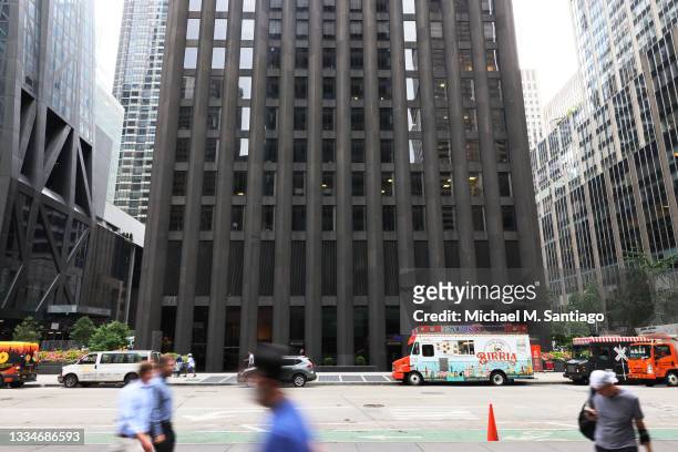 People walk past the CBS Building, also known as the Black Rock building on August 17, 2021 in New York City. ViacomCBS is selling the building to...