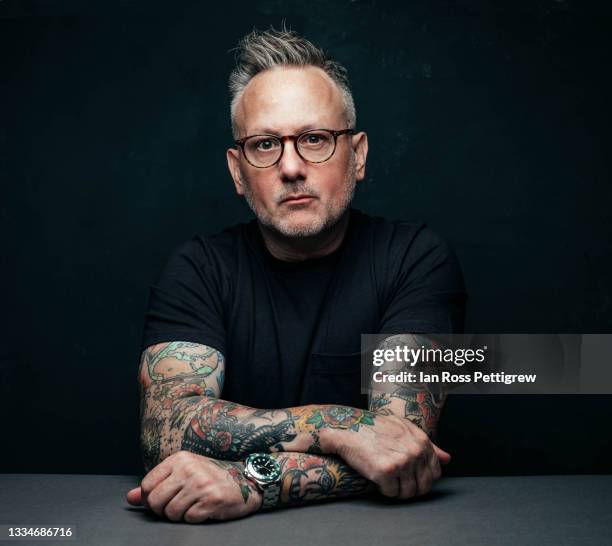 portrait of middle-aged man in black t-shirt and tattoos - black t shirt stock pictures, royalty-free photos & images