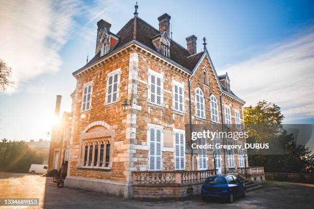 beautiful french town hall castle of ambronay small village in ain department - french chateau stock pictures, royalty-free photos & images