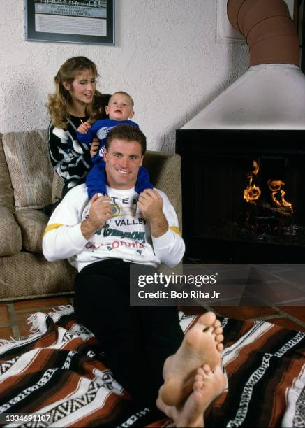 Los Angeles Raiders Howie Long, 8-month-old son Christopher and his wife Diane at home, December 20, 1986 in Redondo Beach, California.