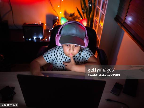girl playing game live streaming on laptop - cyber punk girl stock pictures, royalty-free photos & images