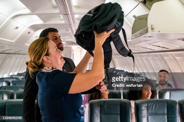 passengers flying - airline service stock pictures, royalty-free photos & images