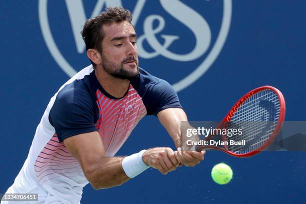 Marin Cilic of Croatia plays a backhand during his match against aj during Western & Southern Open - Day 3 at Lindner Family Tennis Center on August...