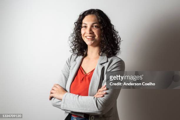 latin woman over 30 years old posing in studio - 30 34 years stock pictures, royalty-free photos & images