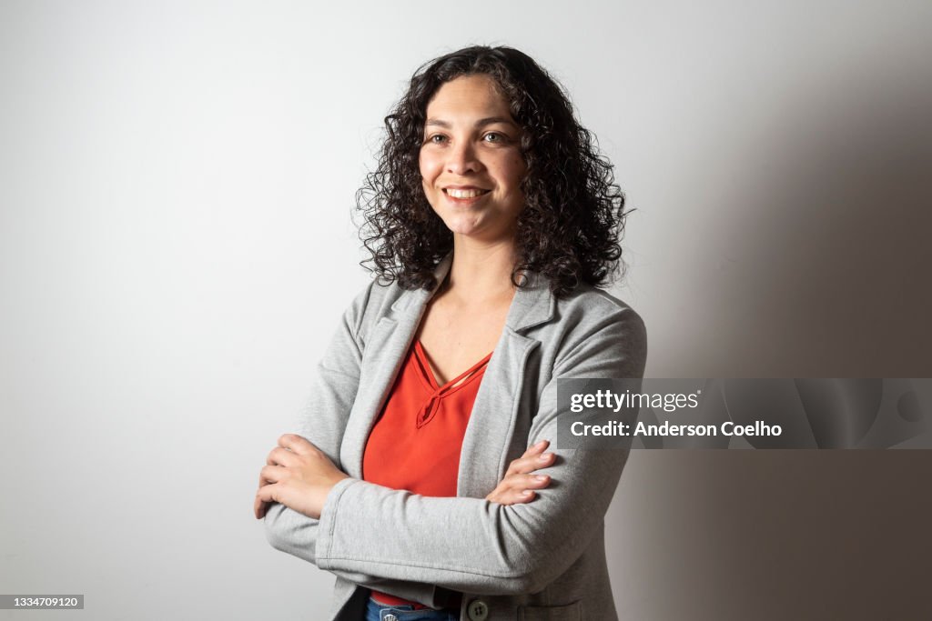 Latin woman over 30 years old posing in studio