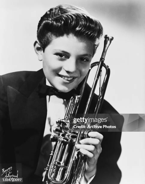 American singer-songwriter and trumpeter Frankie Avalon in a publicity image for his debut single, 'Trumpet Sorrento', location unspecified, 1954....