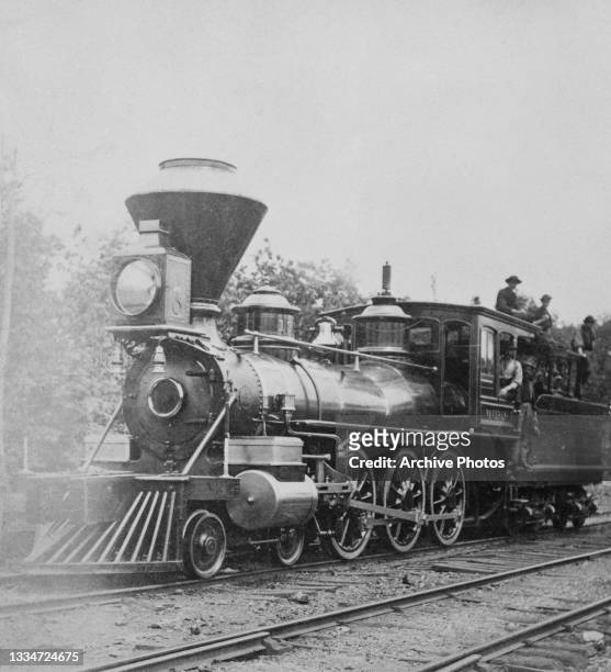 Stereoscopic image of a Central Pacific 4-4-0 'American' type steam locomotive, location unspecified, circa 1875. Designed by Andrew Jackson Stevens,...