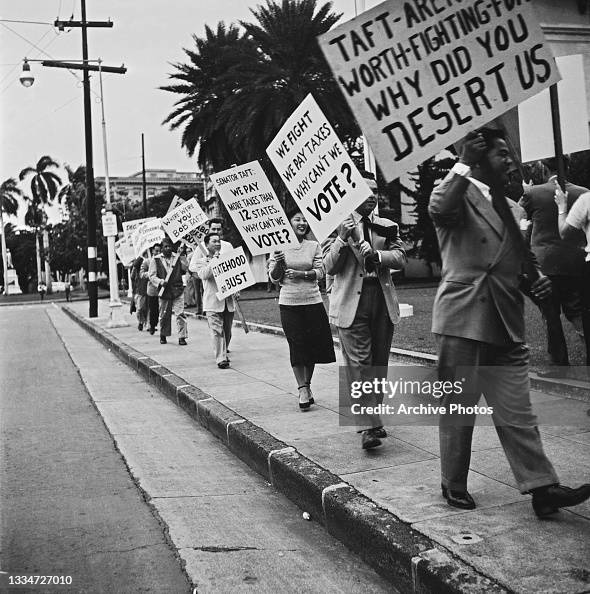 Protesting Riot 1950s Protestors holding placards during a protest against Robert A Taft ...