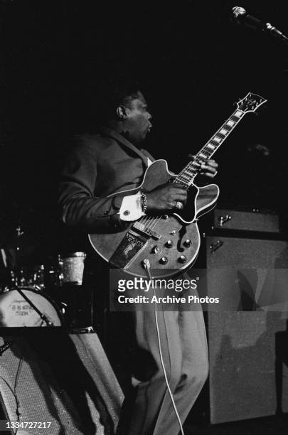 American singer-songwriter and guitarist BB King playing a Gibson ES-355 semi-acoustic guitar as he performs live at the Fillmore East, New York...