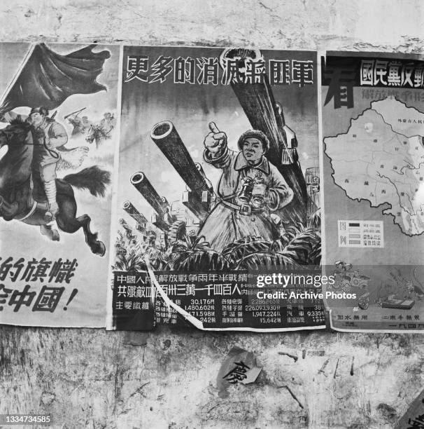 Communist posters depicting a member of the Chinese military on horseback, the Chinese flag in his hand, the middle poster depicts Chinese military...