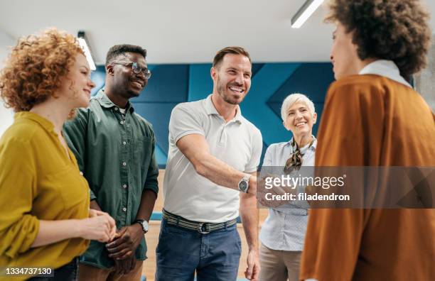 handshake for the new agreement - beginnings stock pictures, royalty-free photos & images