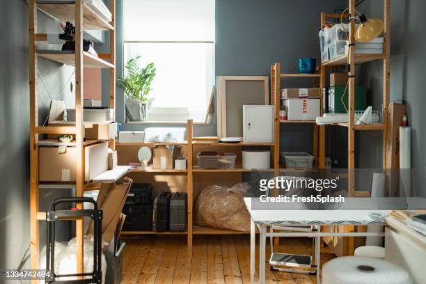 new normal concept- storage room of a small online shop ( horizontal shot ) - bezittingen stockfoto's en -beelden