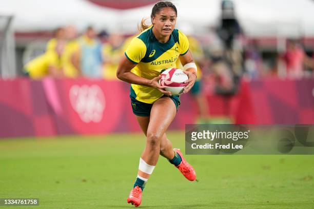 Faith Nathan of Team Australia scores a try in the Women"u2019s Quarter Final match between Team Fiji and Team Australia during the Rugby Sevens on...