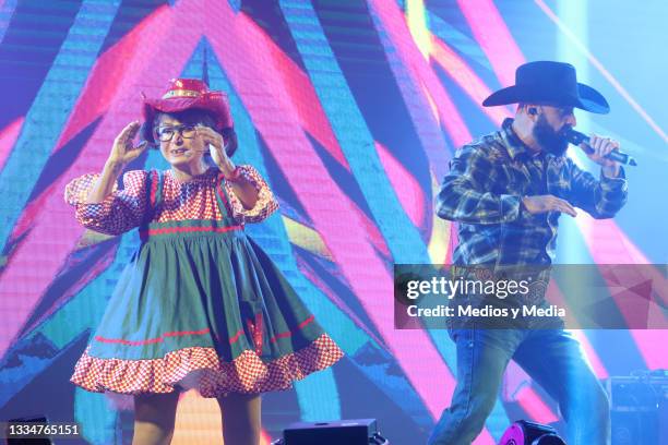 María Antonieta de las Nieves aka La Chilindrina and Luk Vegas perform on stage at Salon Las Tertulias on August 17, 2021 in Mexico City, Mexico....