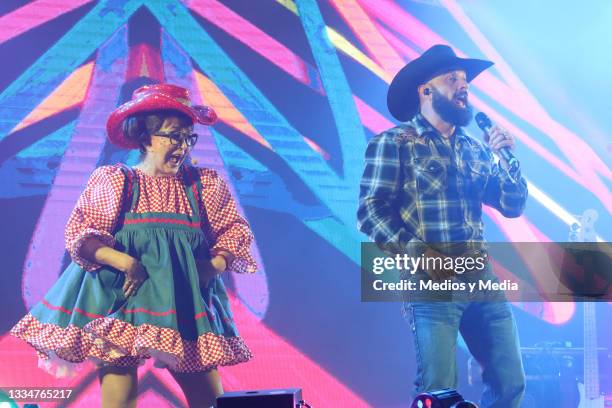 María Antonieta de las Nieves aka La Chilindrina and Luk Vegas perform on stage at Salon Las Tertulias on August 17, 2021 in Mexico City, Mexico....