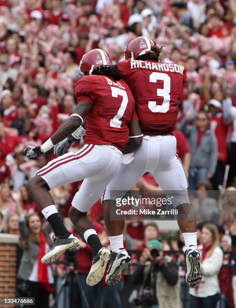 Running back Trent Richardson of the Alabama Crimson Tide celebrates with wide receiver and teammate Kenny Bell after Richardson's first half...