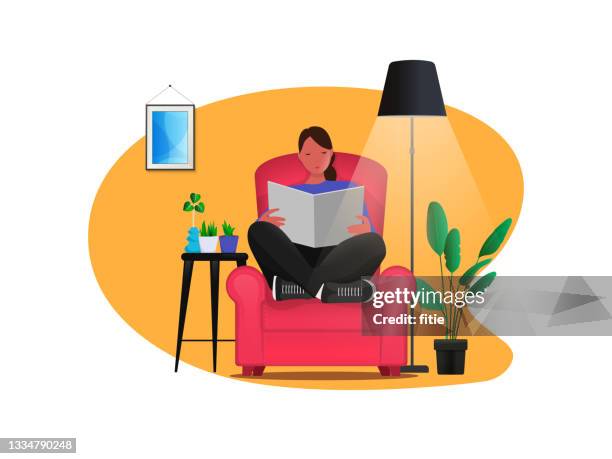 staying at home.beauty girl sitting in the red sofa and reading books.warm colored home interior. - bookshelf background stock illustrations