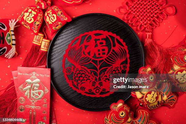 chinese new year still life - chinese new year red envelope stock pictures, royalty-free photos & images