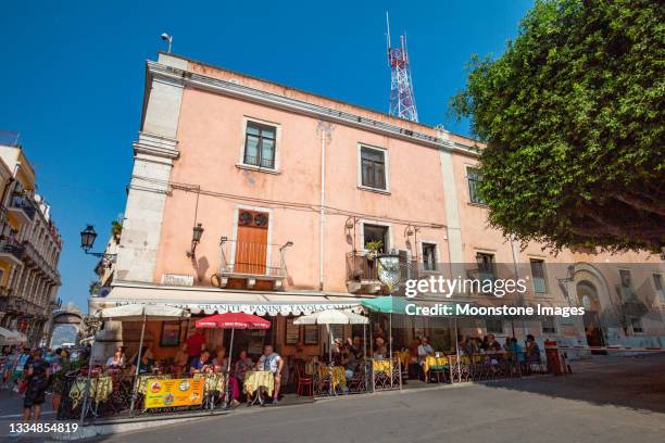 sidewalk cafe in taormina, sicily - sicily stock pictures, royalty-free photos & images