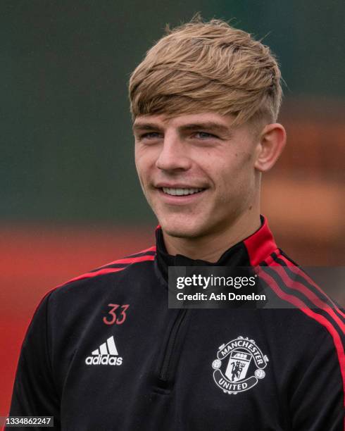 Brandon Williams of Manchester United in action during a first team training session at Carrington Training Ground on August 18, 2021 in Manchester,...