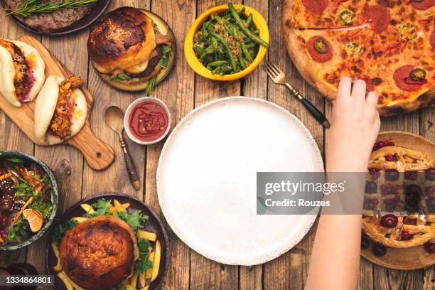 served dining table with empty plate - cheeseburger pie stock pictures, royalty-free photos & images