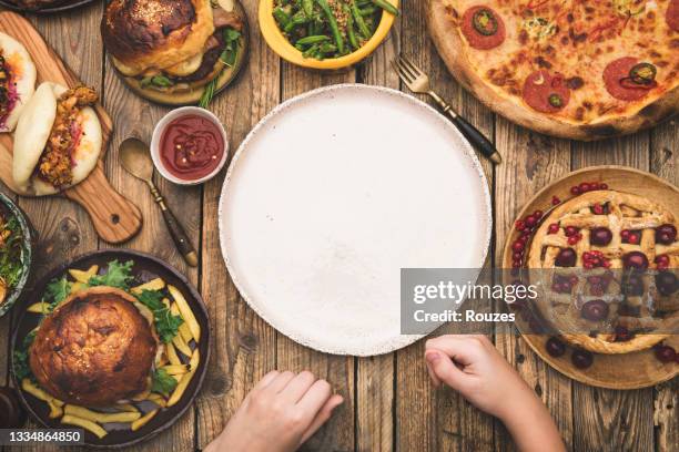 served dining table with empty plate - cheeseburger pie stock pictures, royalty-free photos & images